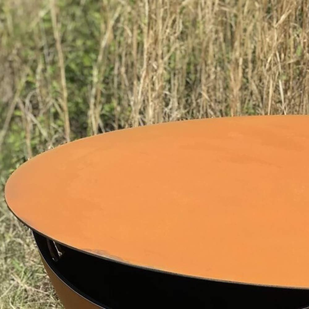 Durable steel fire pit lid, stylishly converting a fire pit into a functional patio table.